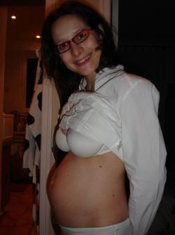 Pregnant milf with glassesposing  17/84