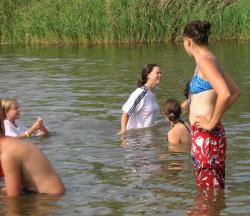 Funny girls on lake in wet shirts 6/33