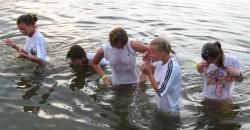 Funny girls on lake in wet shirts 12/33