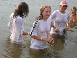 Funny girls on lake in wet shirts 11/33