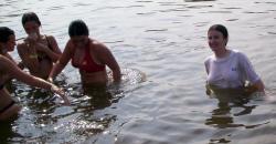Funny girls on lake in wet shirts 24/33