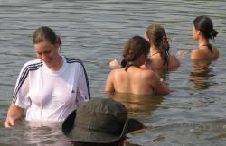 Funny girls on lake in wet shirts 29/33