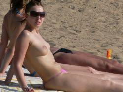 Spying on topless russian beach hottie (un)aware   2/32