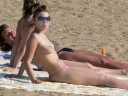 Spying on topless russian beach hottie (un)aware   3/32