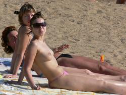 Spying on topless russian beach hottie (un)aware   10/32