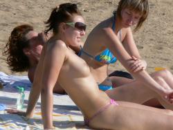 Spying on topless russian beach hottie (un)aware   21/32