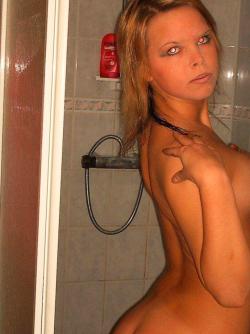 Blond girl in shower 1/24