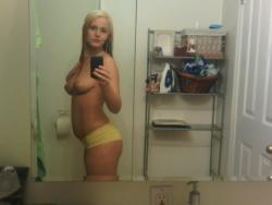 Blonde girl posing in lingerie and nude selfpics 9/10