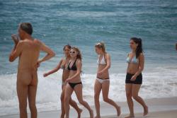Three teen girls blend in on a nudist beach 14/14
