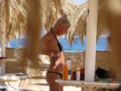 Blond beach girl problems with the bikini 28/47