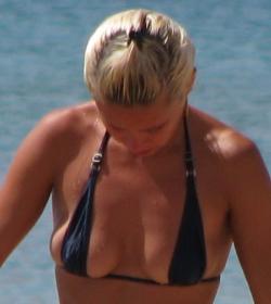 Blond beach girl problems with the bikini 38/47