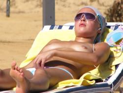 Blond beach girl problems with the bikini 47/47