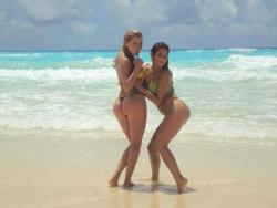 2 blonde latinas posing on the beach 4/67