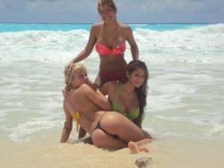 2 blonde latinas posing on the beach 53/67
