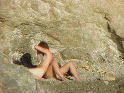 Couple caught fucking on a nudist beach(16 pics)