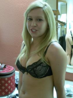 Cute blonde girl gets naked in the hotel  1/12