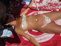 Cool bikini on nude beach 3/10