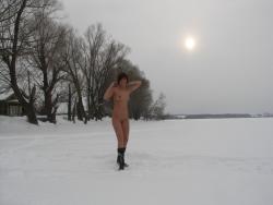 Outdoor naked teen on the snow 70/76