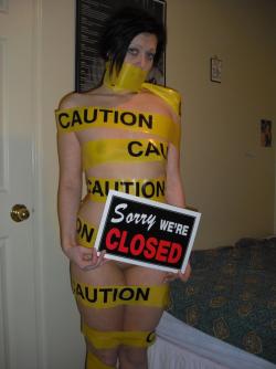 Tight blonde with caution tape 1/42