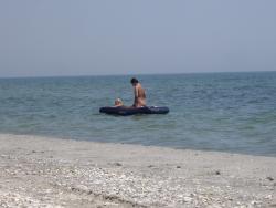 Licking lesbians on beach 20/50