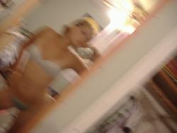 Selfshot blonde in bath mirror 29/33