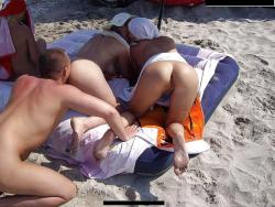 Naturist couples on beach 13/17