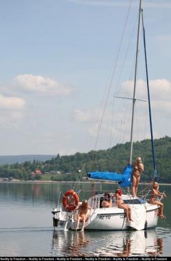 Naked girls sunbathing on the boat 16/23