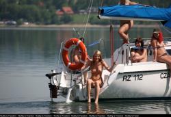 Naked girls sunbathing on the boat 18/23