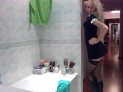 Blond naked girl in bathroom 19/27