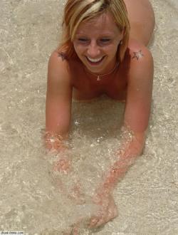 Blond nude on the beach 9/16