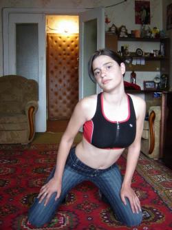 Pretty russian brunette posing at home 15/24