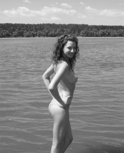 Curly nudist teen at lake 2/66