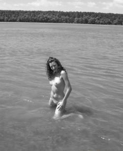 Curly nudist teen at lake 6/66