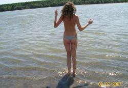 Curly nudist teen at lake 53/66