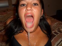 Brunette with a mouth full of sperm 3/9