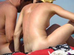 Nudist girl smoke on the beach 20/50