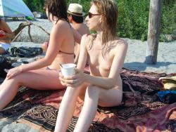 Nudist woman take a drink 4/43