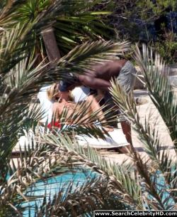 Heidi klum topless sunbathing candids in ibiza 8/12