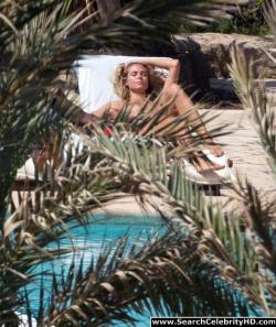 Heidi klum topless sunbathing candids in ibiza 10/12