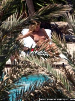 Heidi klum topless sunbathing candids in ibiza 7/12