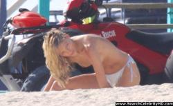 Anja rubik shows off her candid topless boobs at the beach 6/9