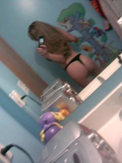 Selfshots - busty blonde in bathroom 36/36