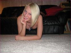 Shaved leggy blonde posing and masturbating 34/82