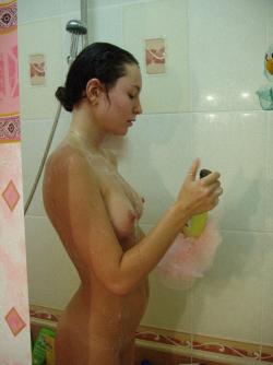 Pretty brunette takes a shower - teen serie 67 3/10