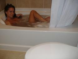 Brunette beauty posing in her bathroom serie 105 4/7