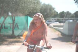 Nudist woman with bikes 2/68