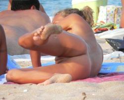 Tanned beach nudist 20/24