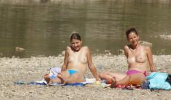 Topless nudist babes with tanga tanning in sun 6/18