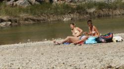 Topless nudist babes with tanga tanning in sun 9/18