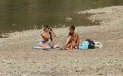 Topless nudist babes with tanga tanning in sun 17/18
